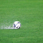 futebol com chuva